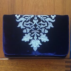 Blue velvet clutch with white embroidery!